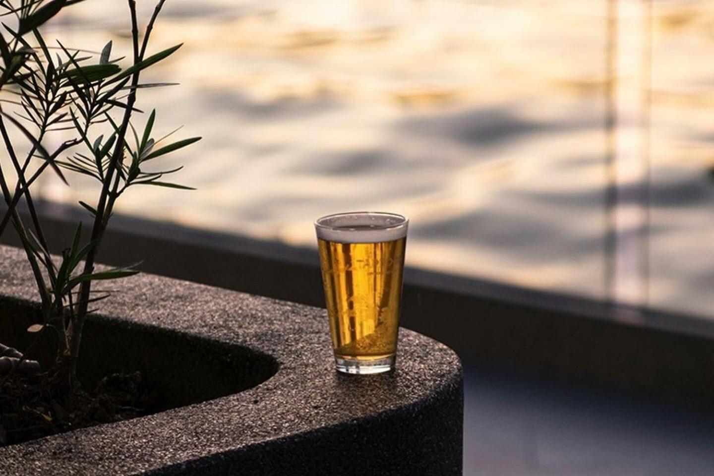 The Salil Hotel Riverside Bangkok Kültér fotó A glass of beer
