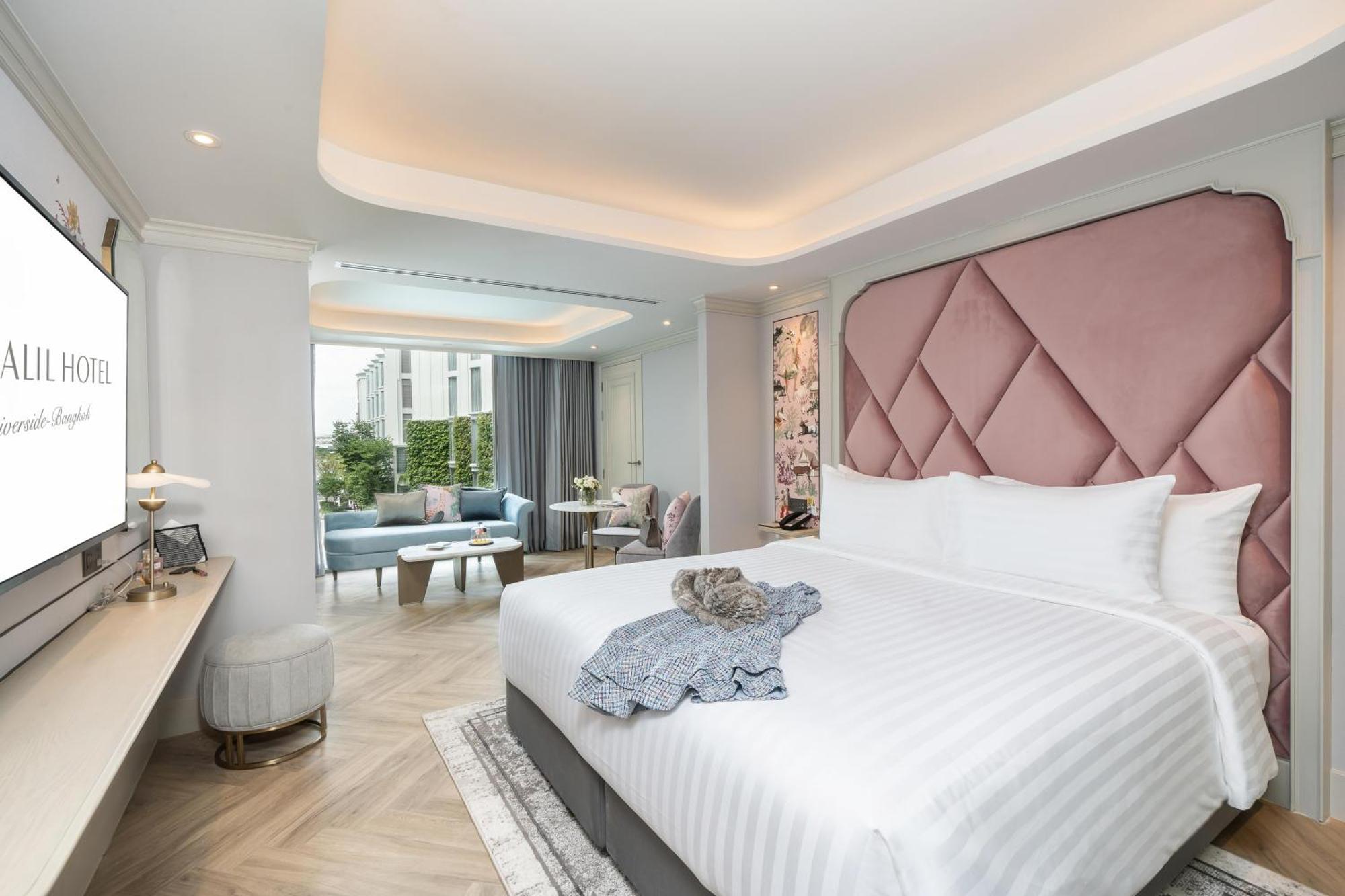 The Salil Hotel Riverside Bangkok Kültér fotó Deluxe Suite