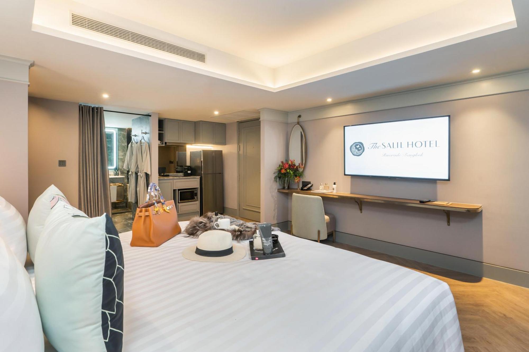 The Salil Hotel Riverside Bangkok Kültér fotó Deluxe Suite