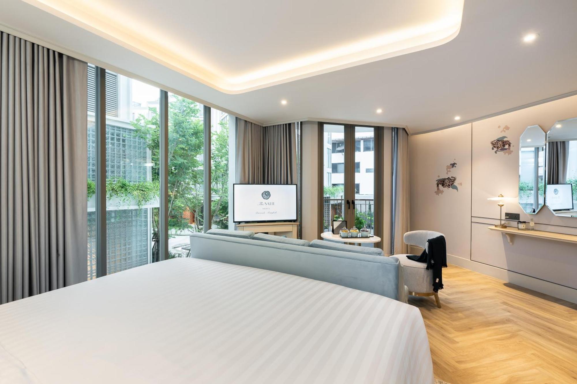 The Salil Hotel Riverside Bangkok Kültér fotó Deluxe Room